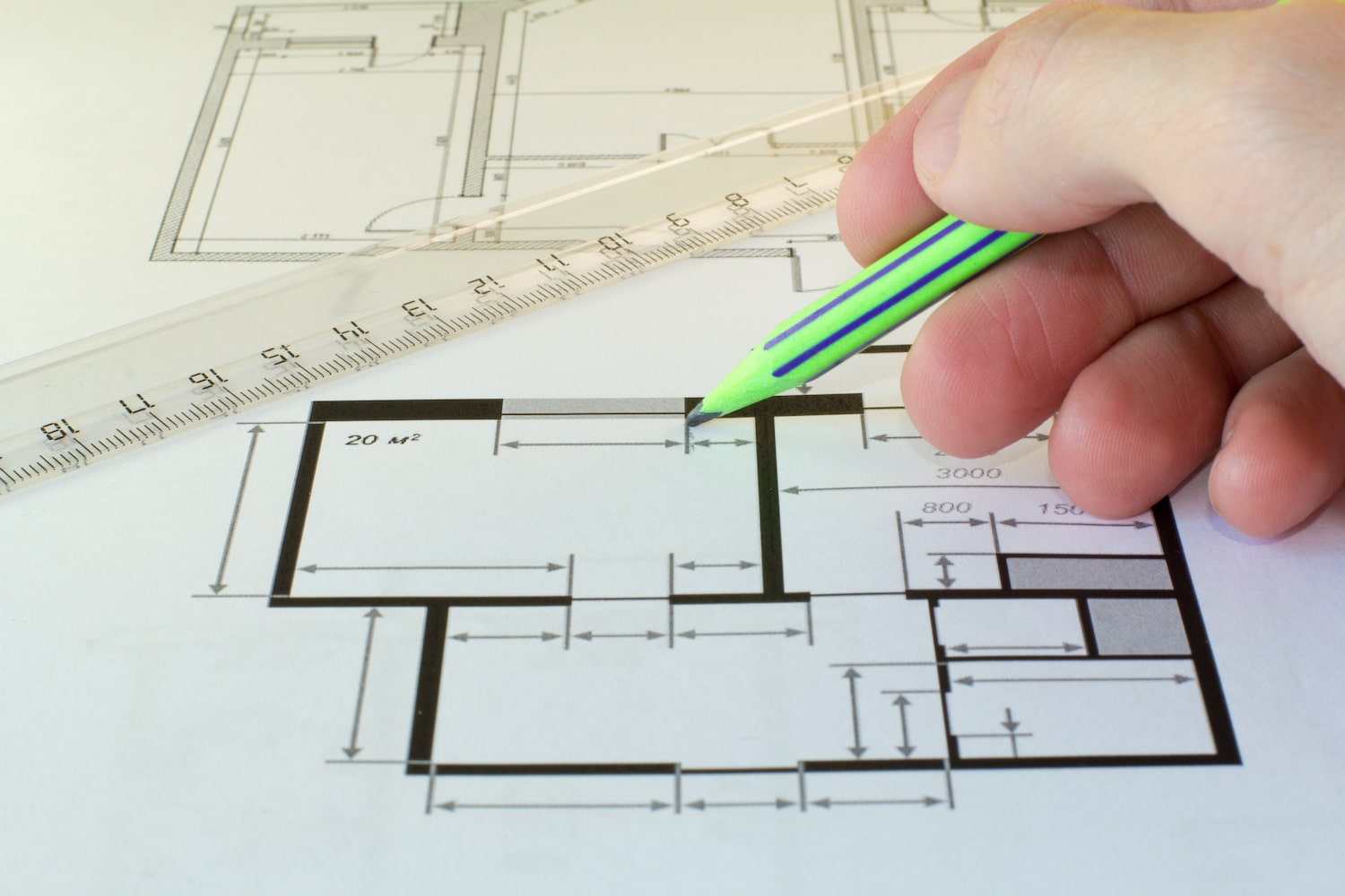 multigenerational homes closeup of architect designing home layout